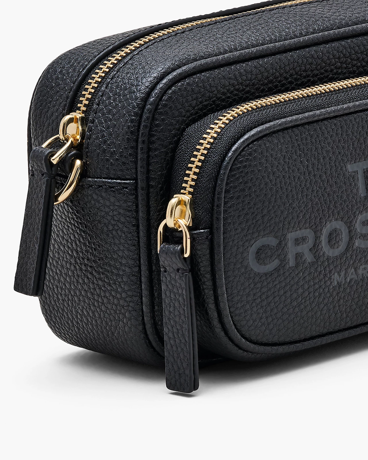 Close up of black bag, showing texture of the leather fabric