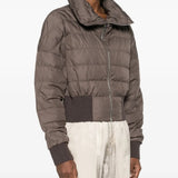 Brown jackets worn by a person, showing the jackets fit