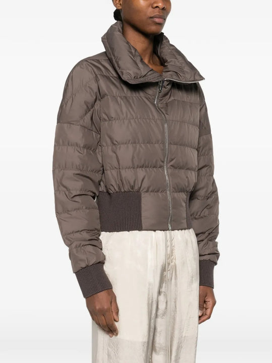 Brown jackets worn by a person, showing the jackets fit