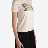 Tan t-shirt worn by a person, showing the  t-shirt fit