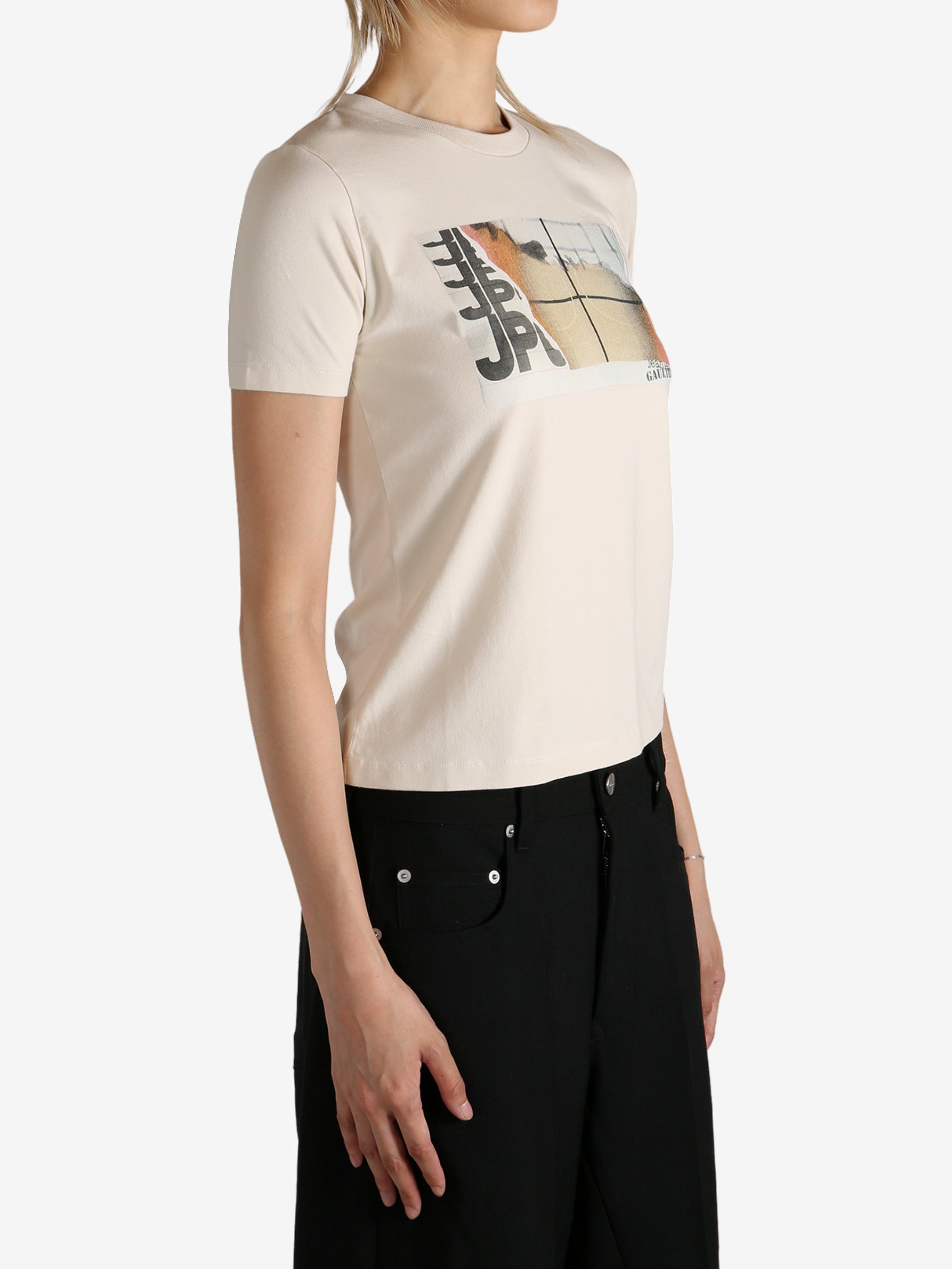 Tan t-shirt worn by a person, showing the  t-shirt fit