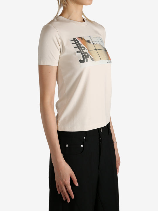 Tan t-shirt worn by a person, showing the  t-shirt fit