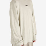 Tan tops worn by a person, showing the tops fit