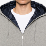 Close up of grey hoodie, showing texture of the Cotton fabric