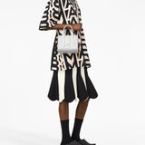 White bag worn by a person, showing the bag's fit