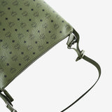 Close up of green bag, showing texture of the leather fabric
