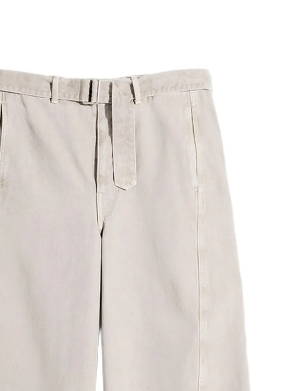 Cloes-up of white pants, showing the detail of belt