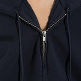 Close up of Navy jacket, showing texture of the 100% cotton fabric