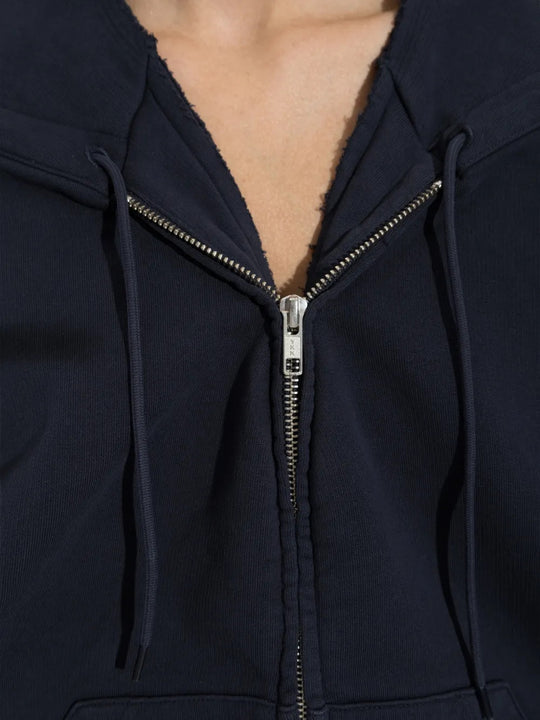 Close up of Navy jacket, showing texture of the 100% cotton fabric