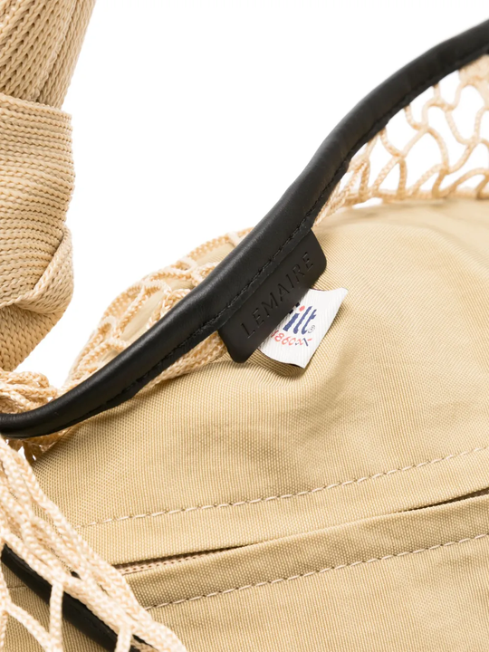 close up of brown bags, showing texture of the polyester fabric