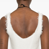 Close up of white tops, showing texture of the mohair fabric