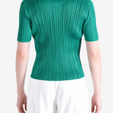 Green shirt worn by a person, showing the shirt fit