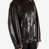 Brown jacket worn by a person, showing the jacket fit
