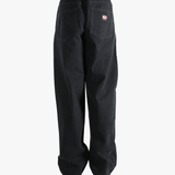 Black jean,worn by a person, showing the jeans fit