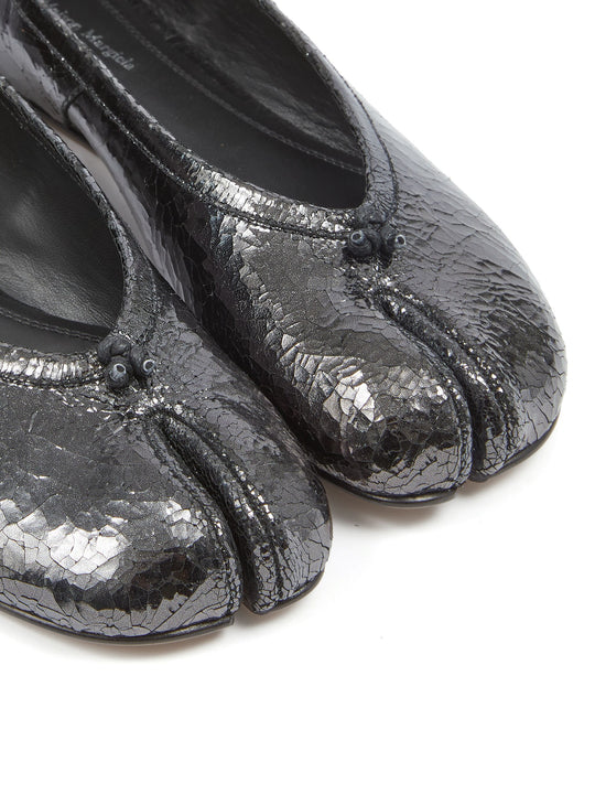 Close up of black flats, showing texture of the leather fabric
