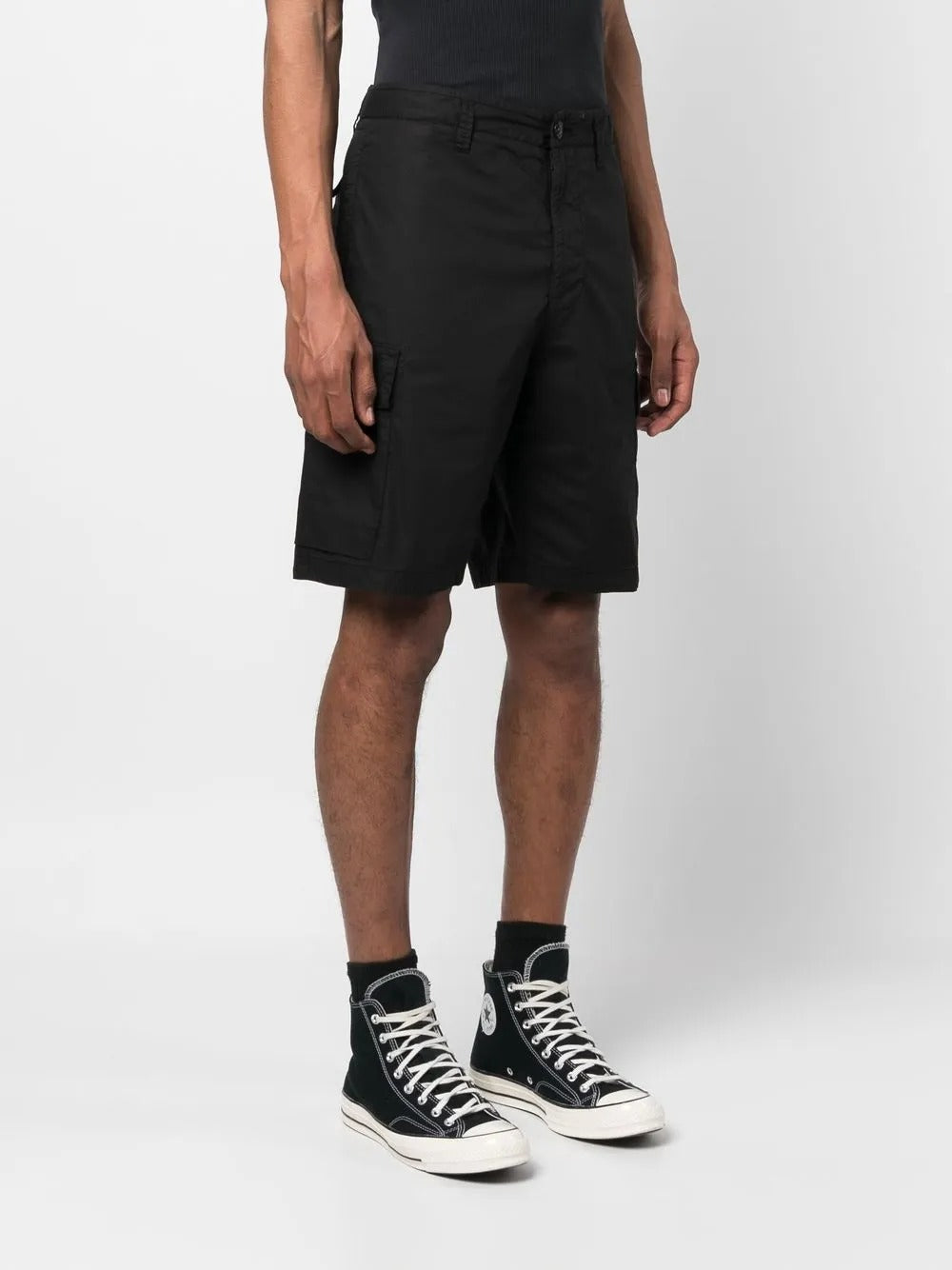 Black shorts worn by a person, showing the shorts fit