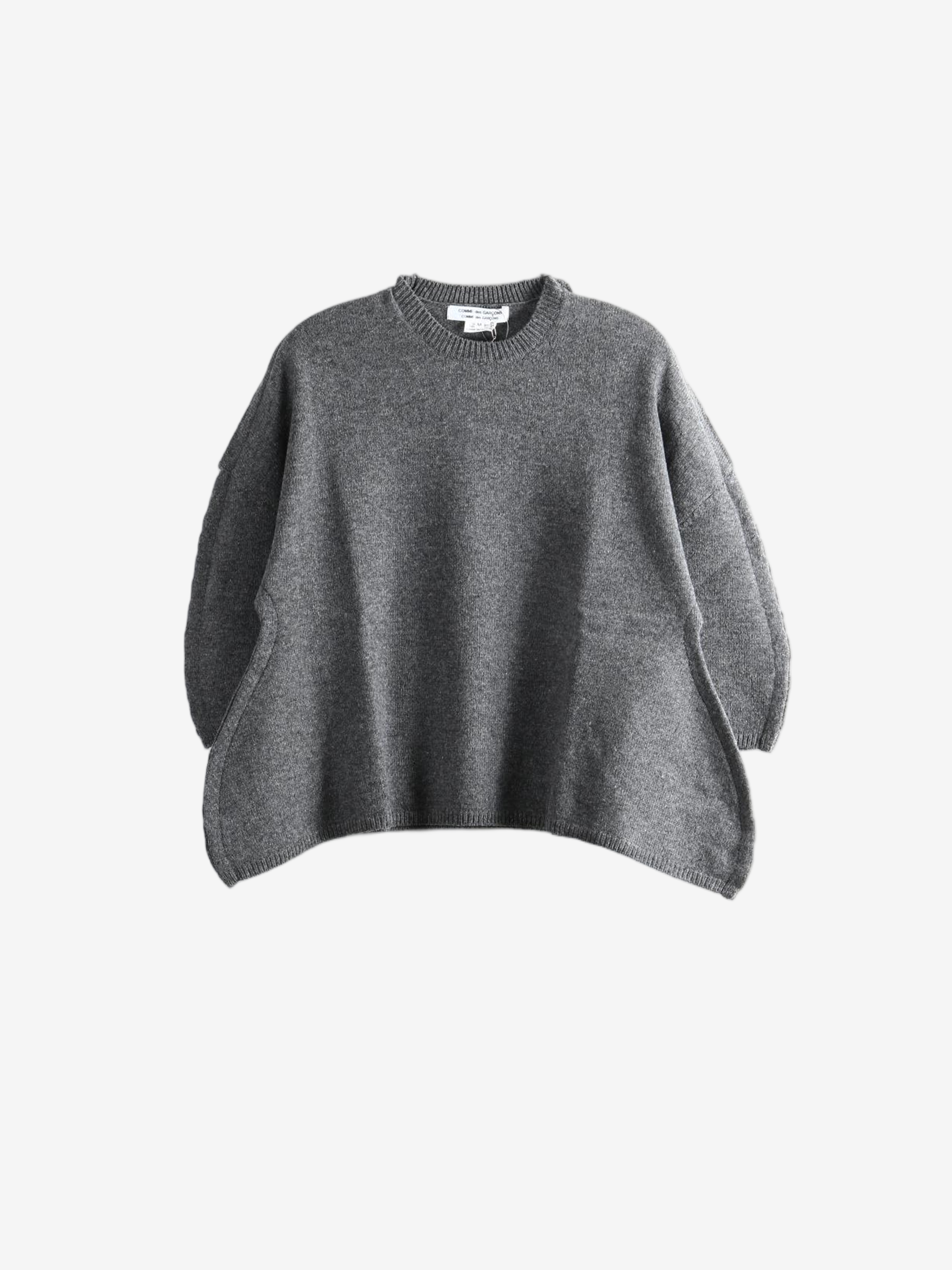 Grey knitwear, front view