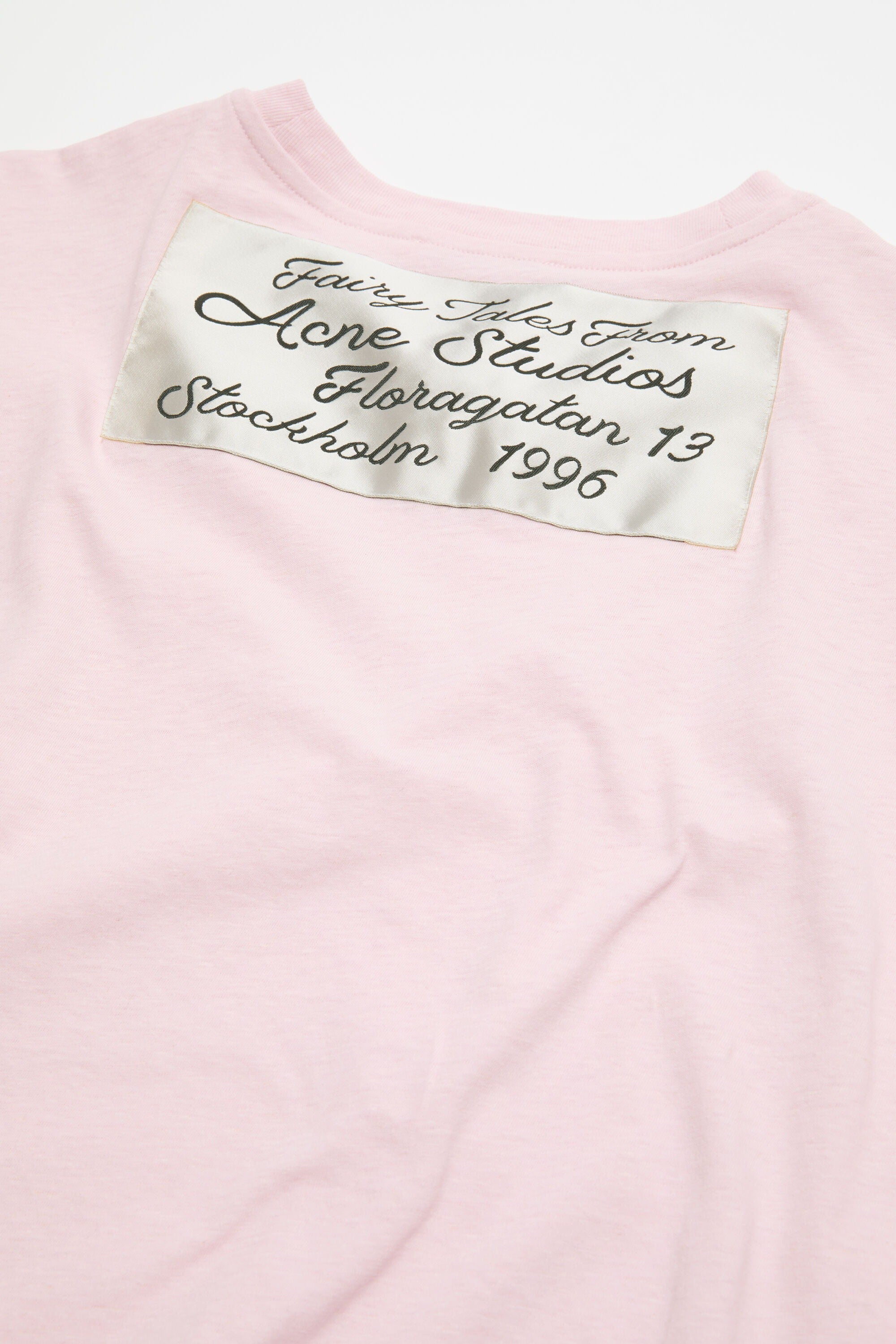 Close up of Pink t-shirt, showing texture of the 100% cotton fabric