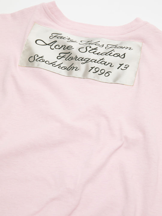 Close up of Pink t-shirt, showing texture of the 100% cotton fabric