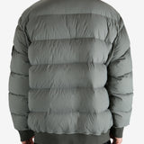 Grey jacket worn by a person, showing the jacket's fit