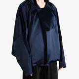 Navy jacket worn by a person, showing the jacket fit