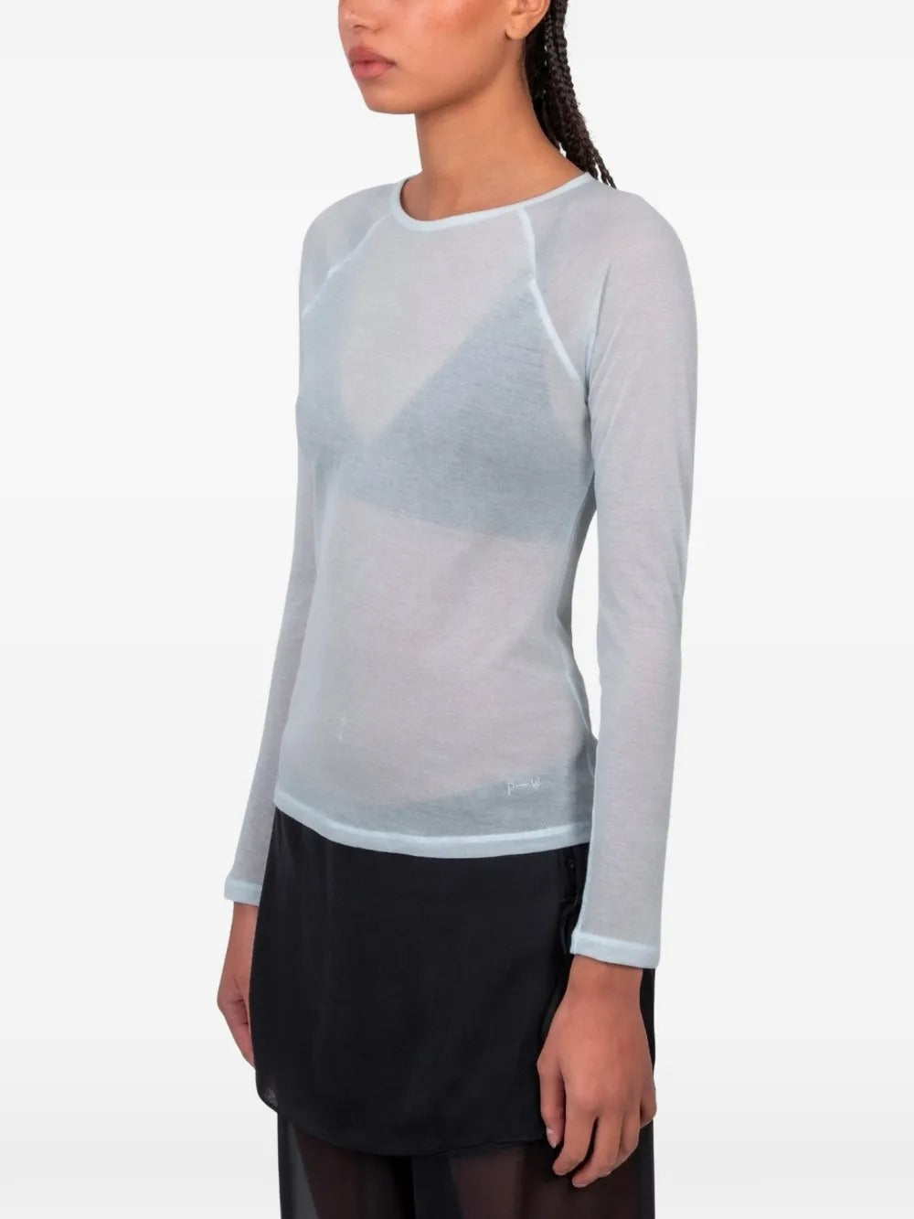 Blue t-shirt worn by a person, showing the t-shirt fit