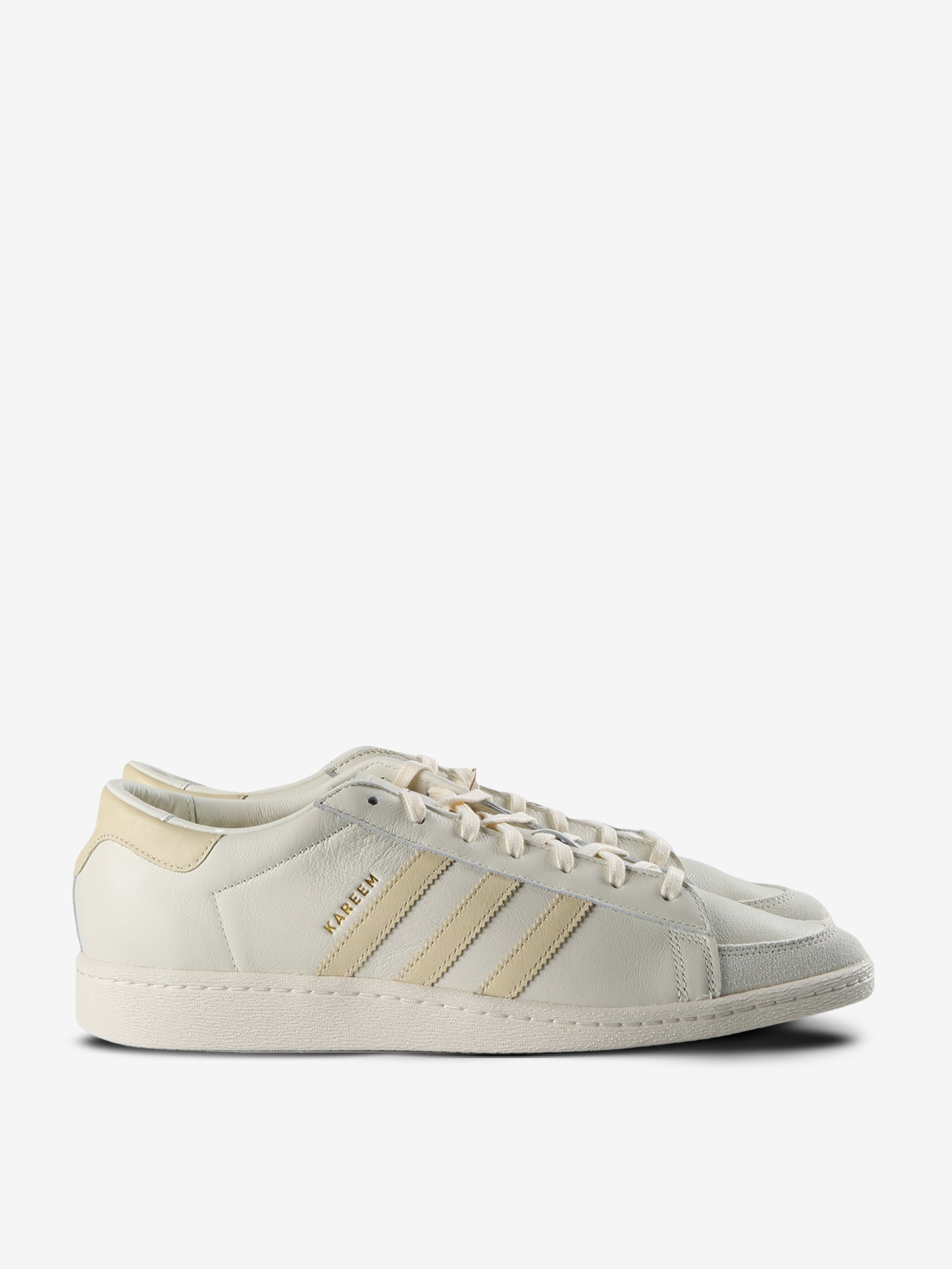 Tan sneakers, side view