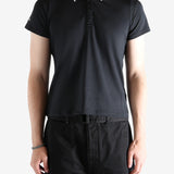 black shirts worn by a person, showing the shirts fit