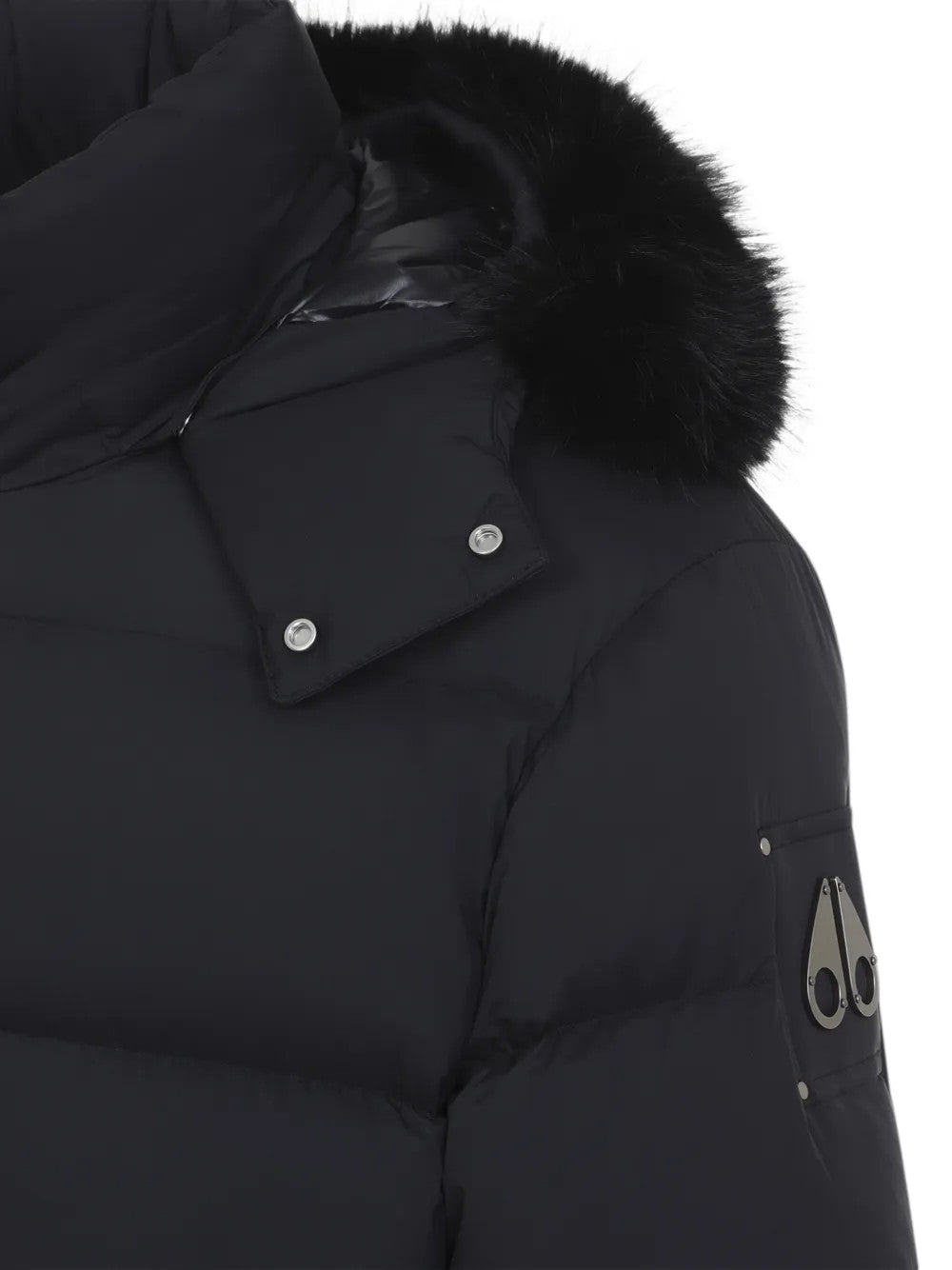 Close up of Black jacket, showing texture of the 100% nylon fabric
