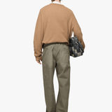 Green jeans, full body view