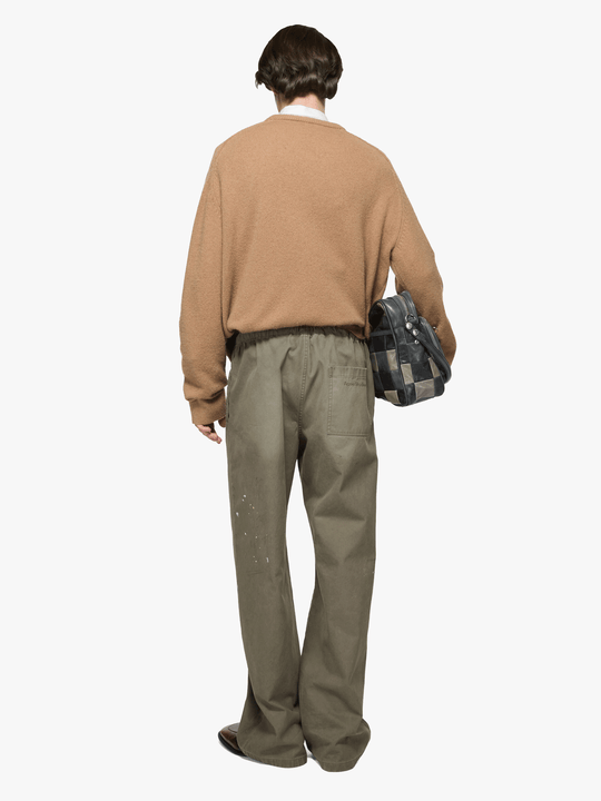 Green jeans, full body view