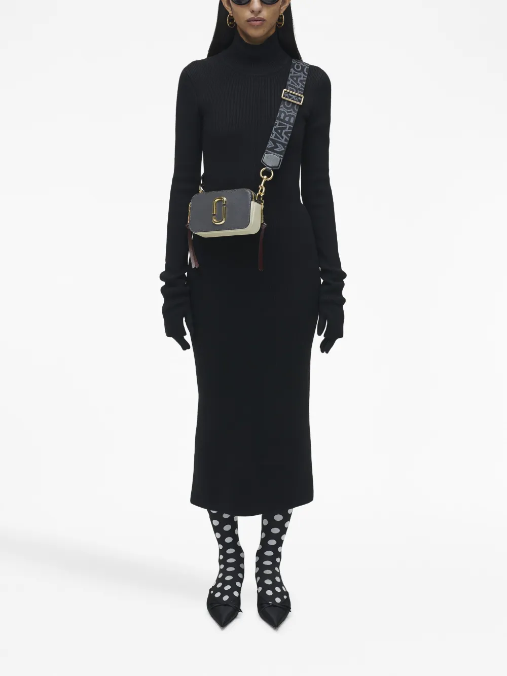 Grey bags worn by a person, showing the bags fit