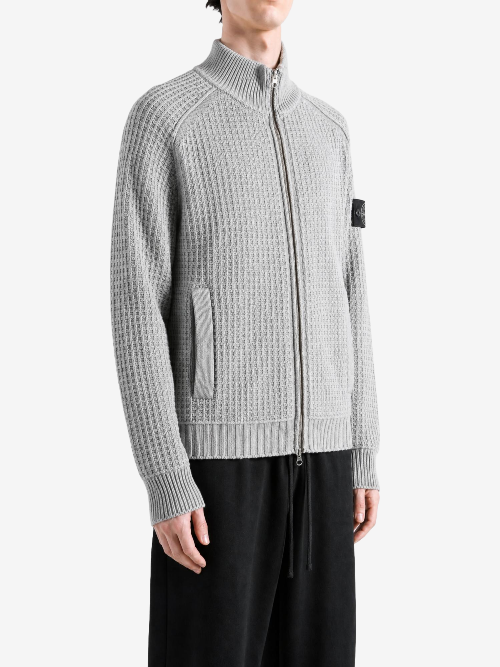 Grey knitwear, front view
