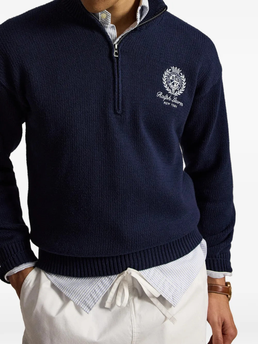 Navy hoodie worn by a person, showing the hoodie fit