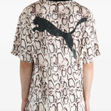 Tan t-shirts worn by a person, showing the t-shirts fit