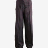 Red pant worn by a person, showing the pant's fit