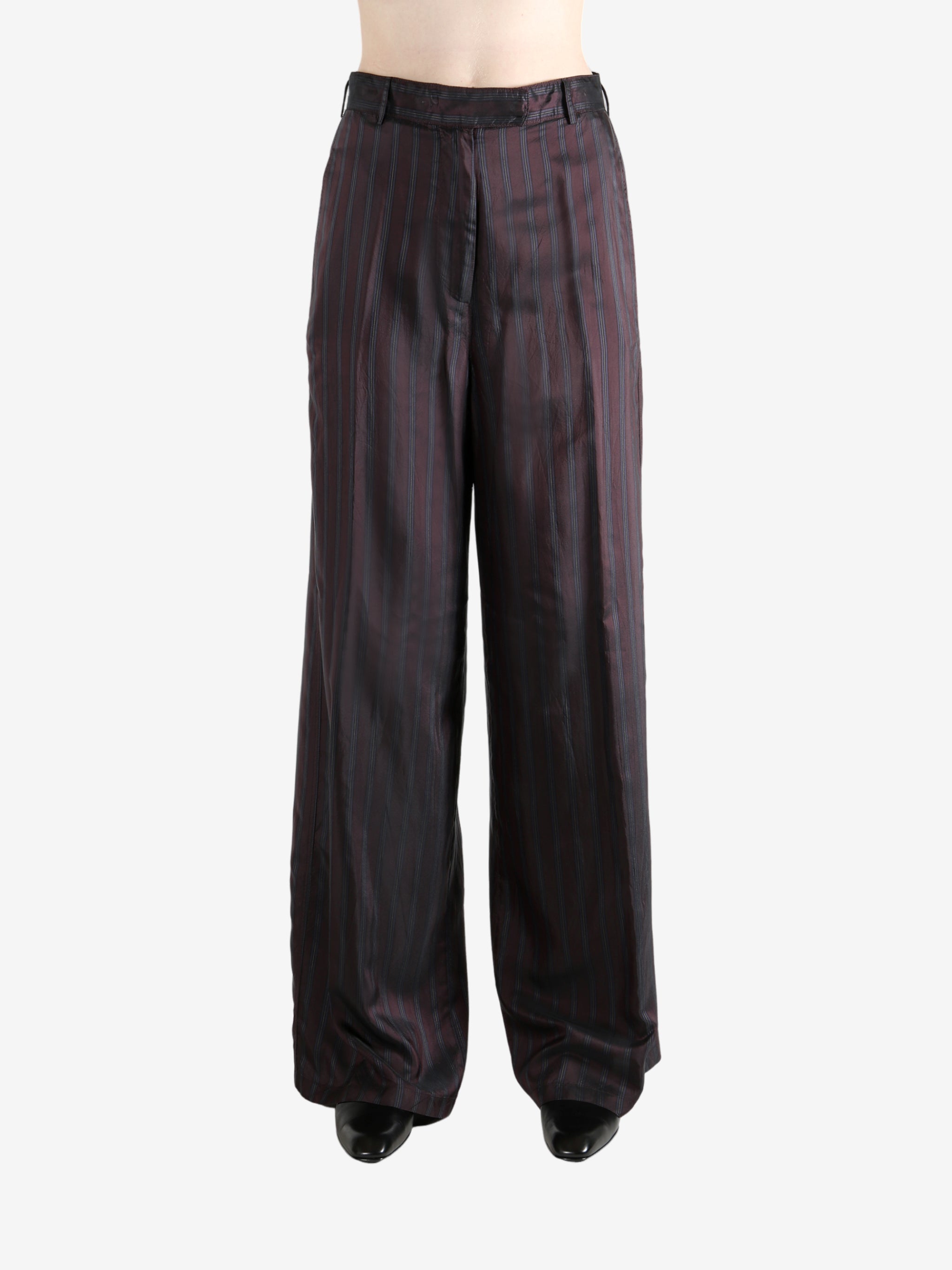 Red pant worn by a person, showing the pant's fit