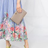 Grey bag worn by a person, showing the bag's fit