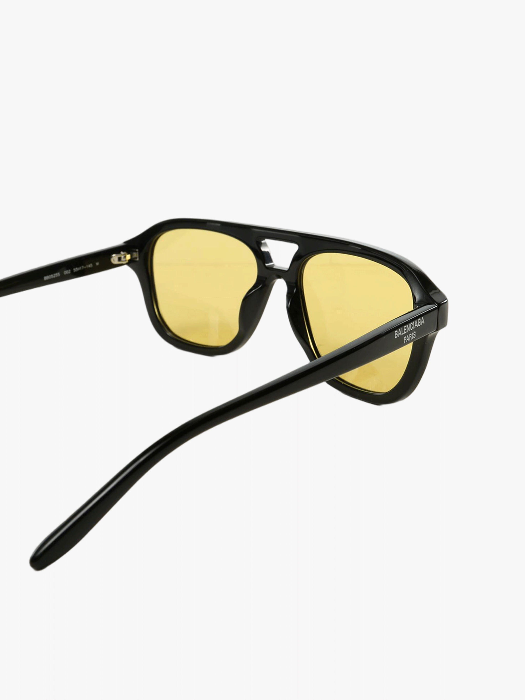 Close up of black sunglasses, showing texture of the Acetate fabric