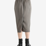 Grey skirt worn by a person, showing the skirt's fit