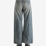 Blue pants worn by a person, showing the pants fit