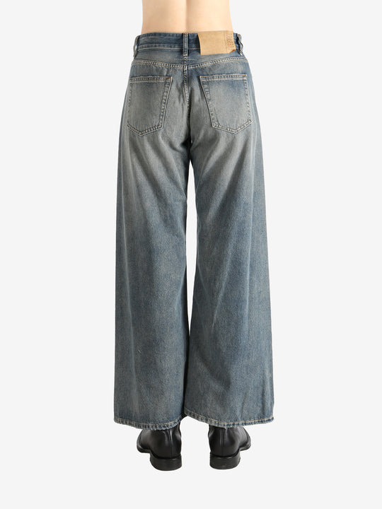 Blue pants worn by a person, showing the pants fit