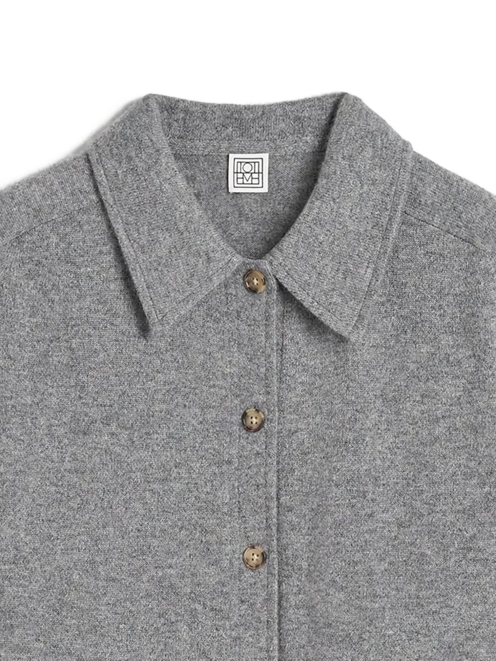 Close up of grey shirt,showing texture of the cashmere fabric.
