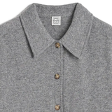 Close up of grey shirt,showing texture of the cashmere fabric.