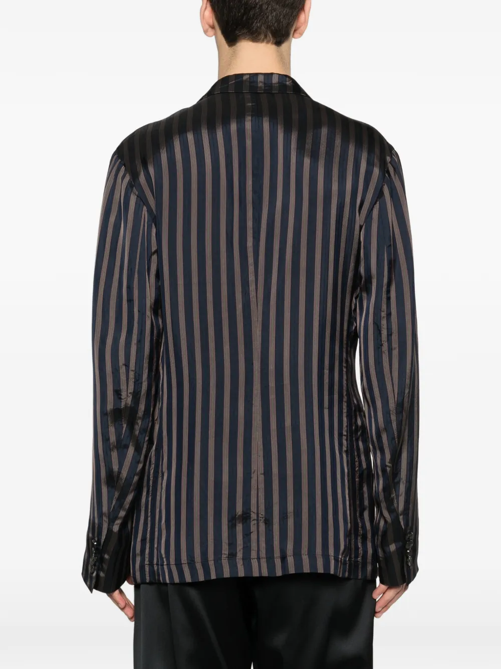 Navy jackets-coats worn by a person, showing the jackets-coats's fit