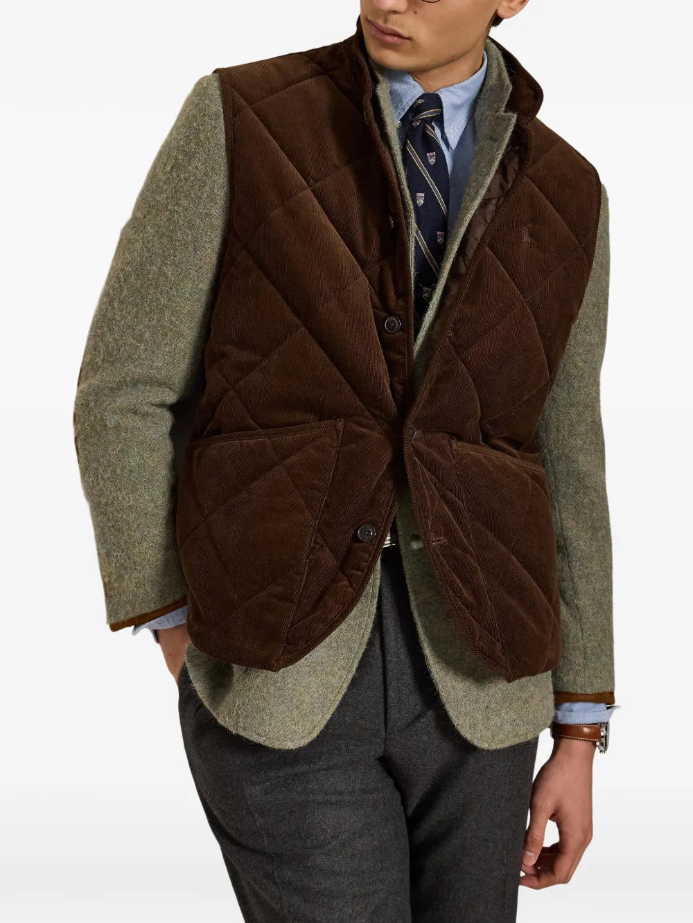 Brown jacket worn by a person, showing the jacket fit