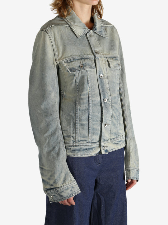 Grey jacket worn by a person, showing the jacket fit