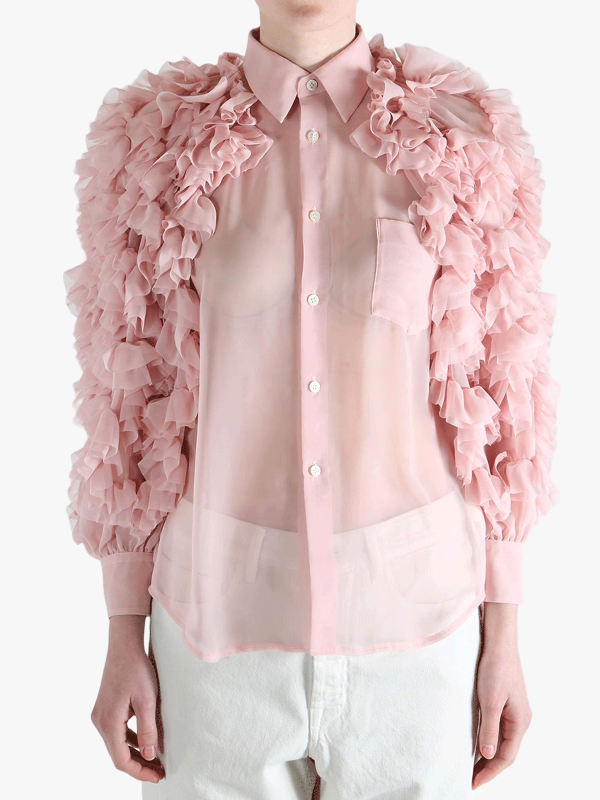 Pink blouse worn by a person, showing the blouse fit