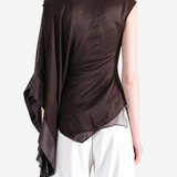 Brown top worn by a person, showing the top fit