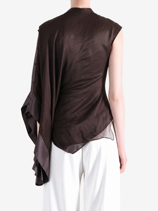 Brown top worn by a person, showing the top fit